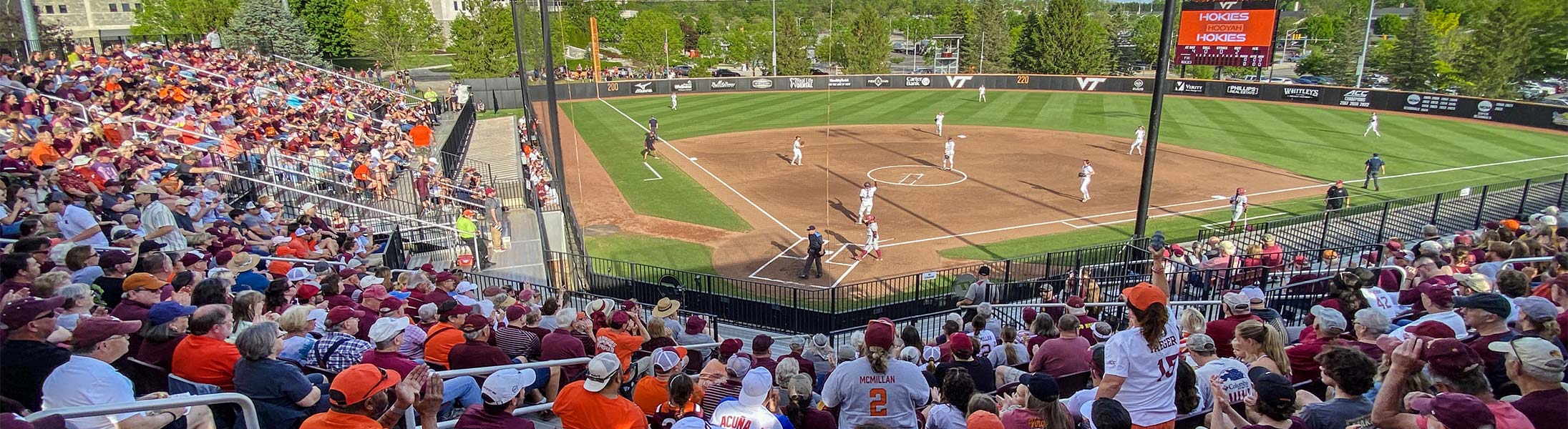 Fans in the stands at baseball game